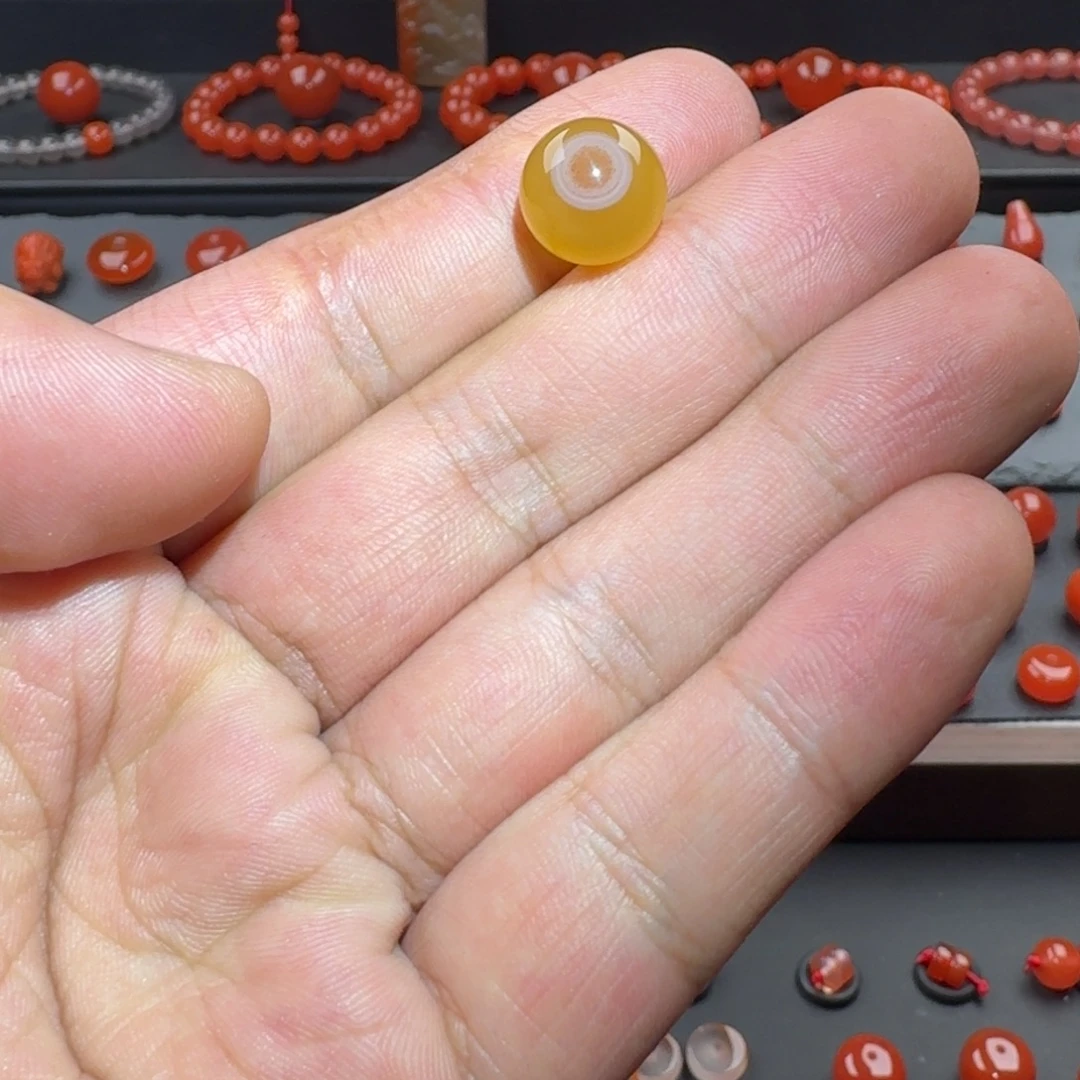 南红玛瑙未镶嵌鸡油黄天眼圆珠11.7完美无暇