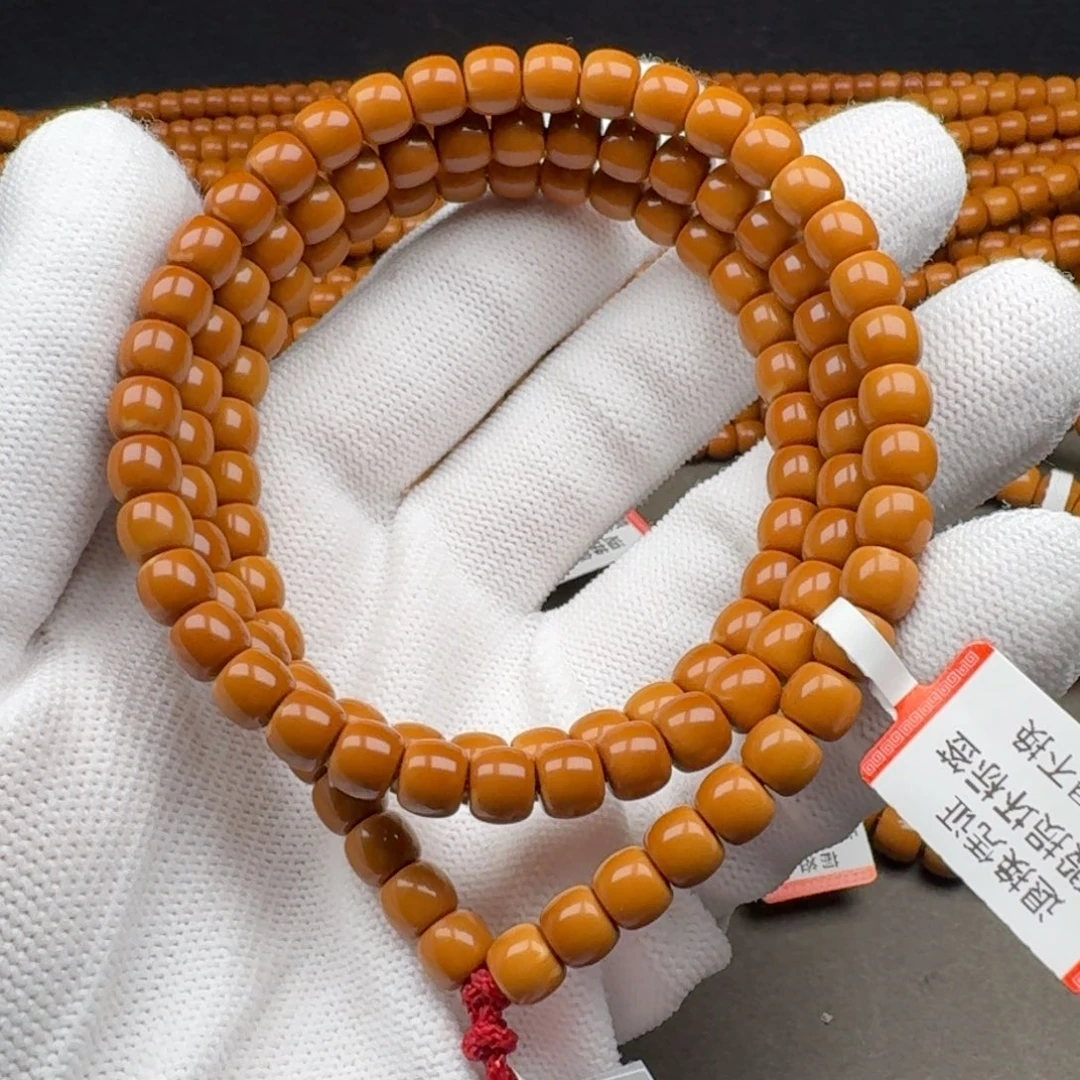 ****手吊坠橄榄核福利款老挝核尖长串6.4mm