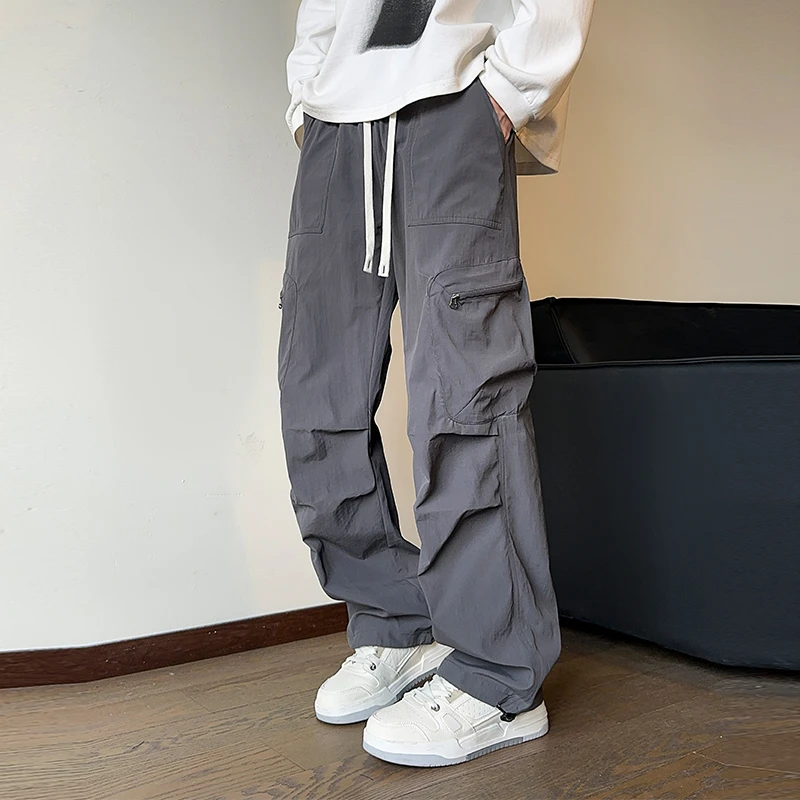 户外潮流机能宽松设计感双侧贴袋拉链冲锋裤