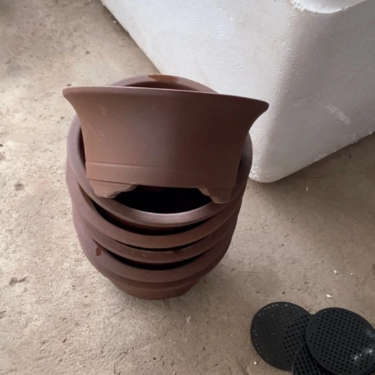 紫砂花盆  50.6。  16-8