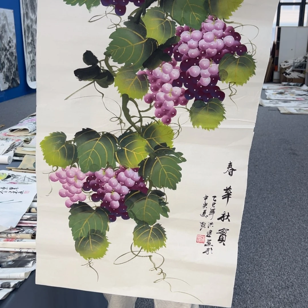 国画卖字画的小男孩