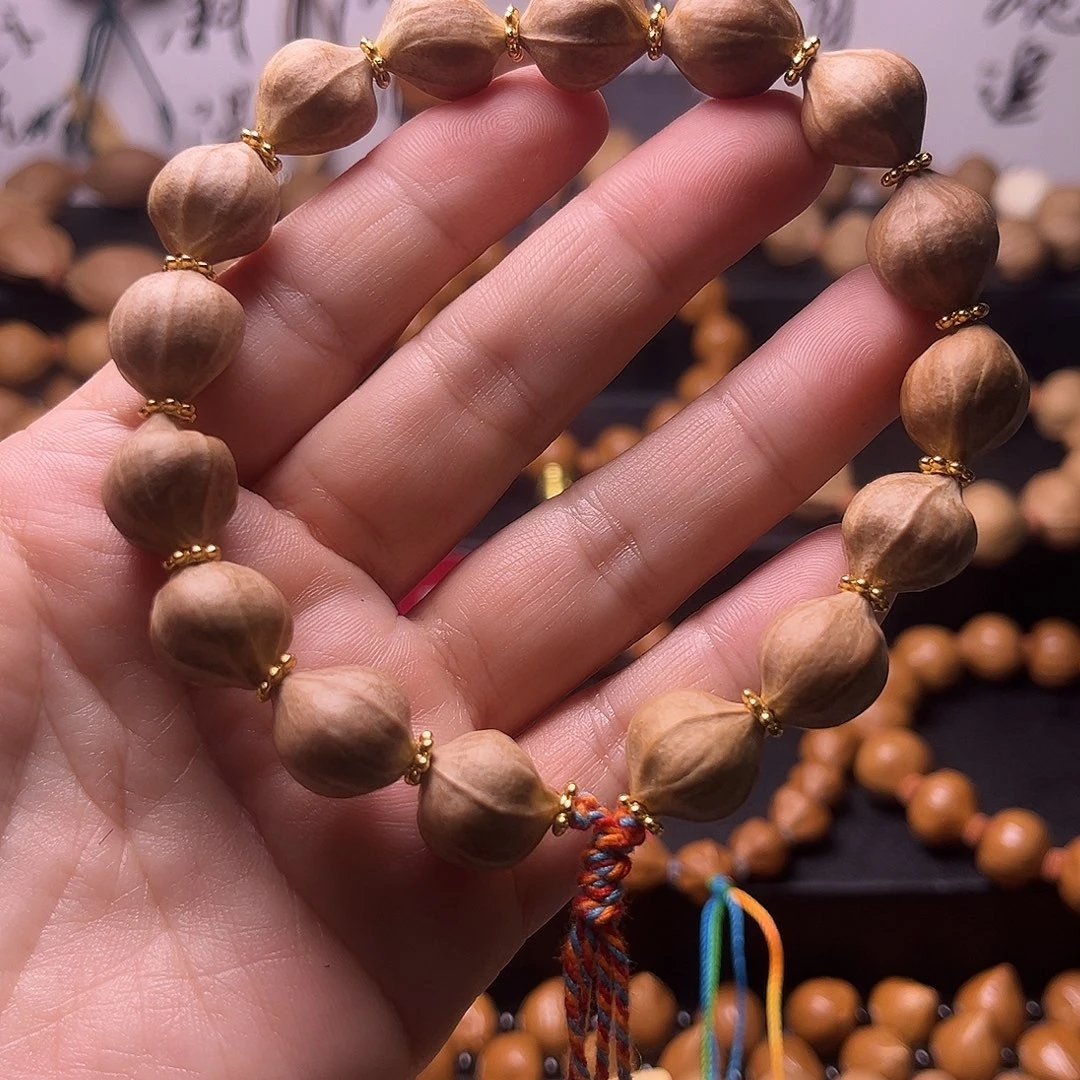 橄榄核吊坠梅林蜜桃臀13.13异型