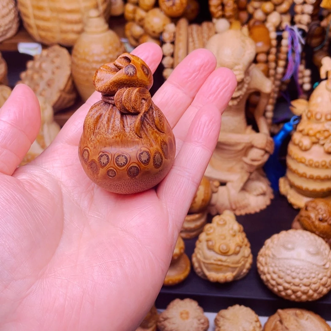 竹竹根雕钱袋子把玩件