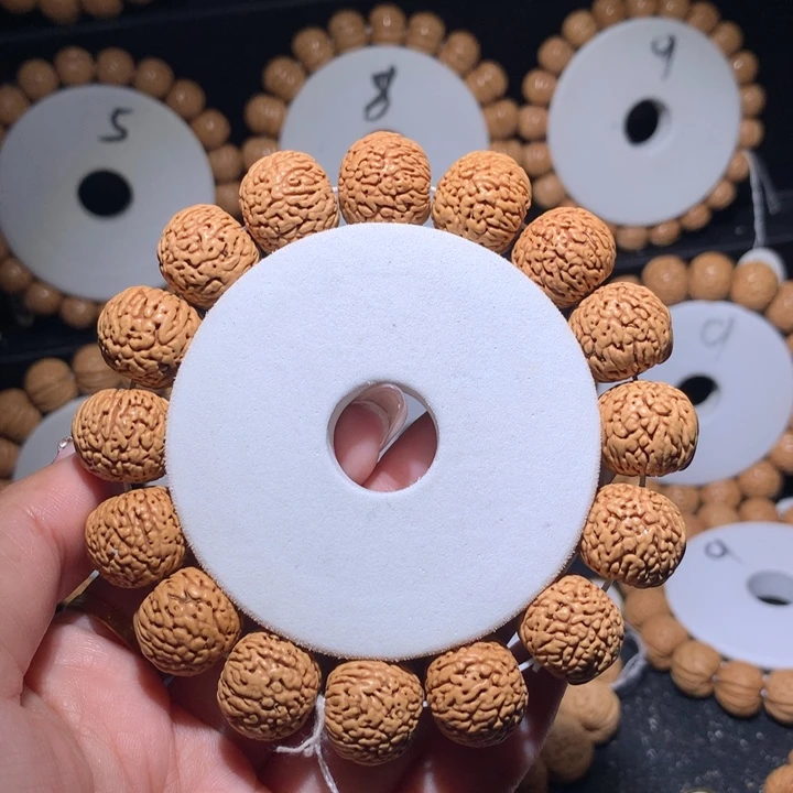 桃核手串正圆龙鳞王