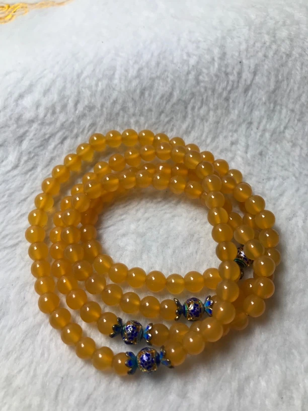 黄龙玉手串5加珠子绕四圈