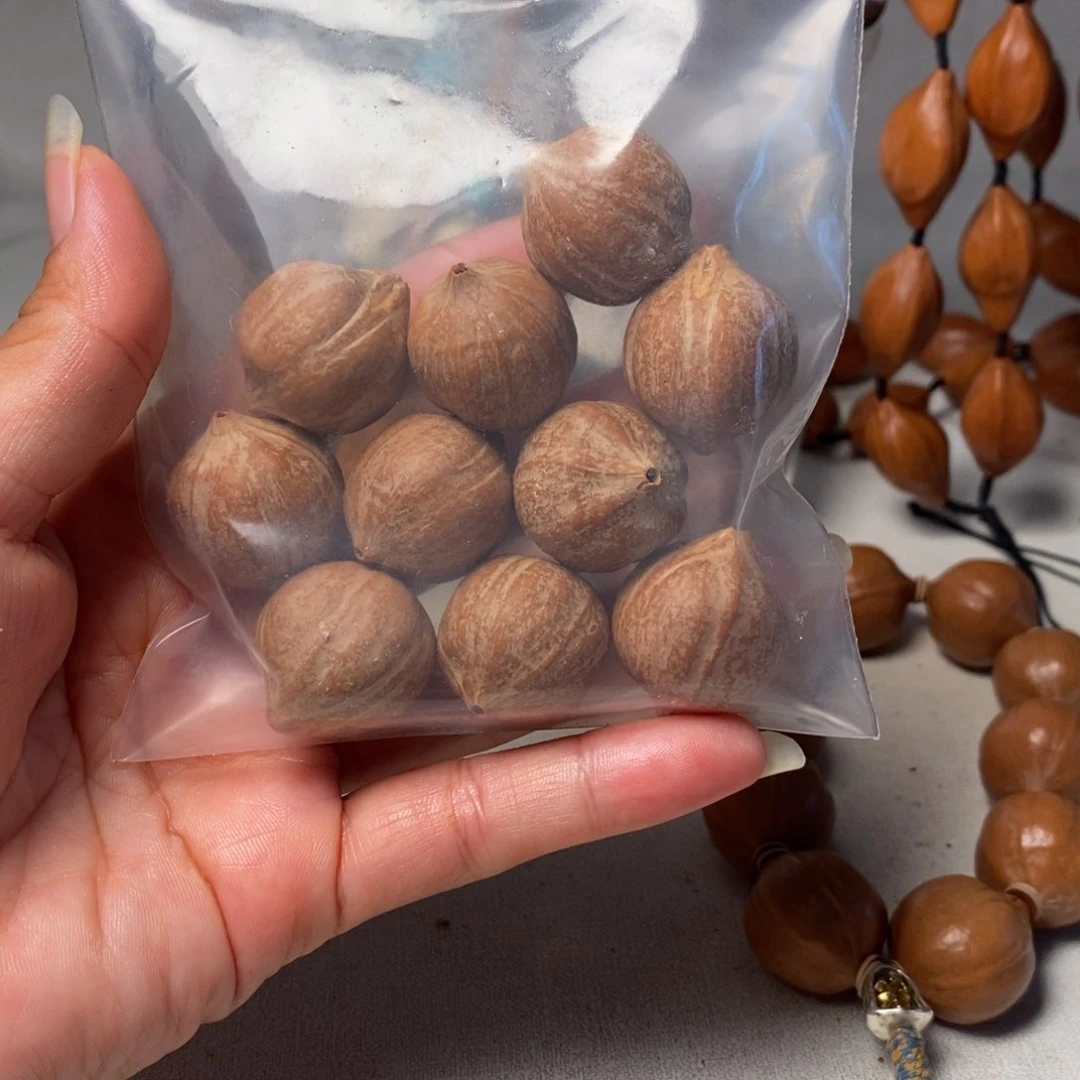 阿***皓橄榄核吊坠大素核