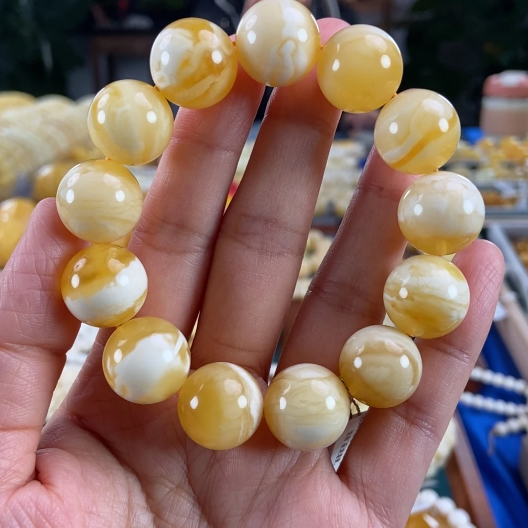 如***哥琥珀未镶嵌珠宝奇石16+溶洞妖花圆珠31.9