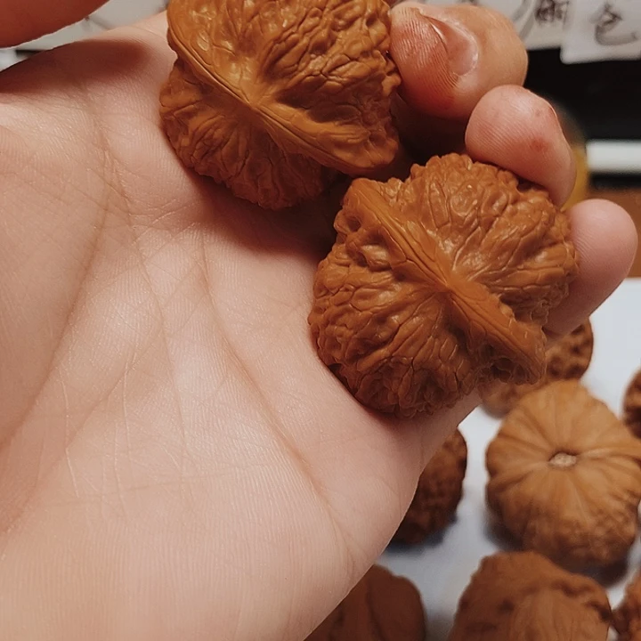 一***舟文玩核桃把件血麒麟