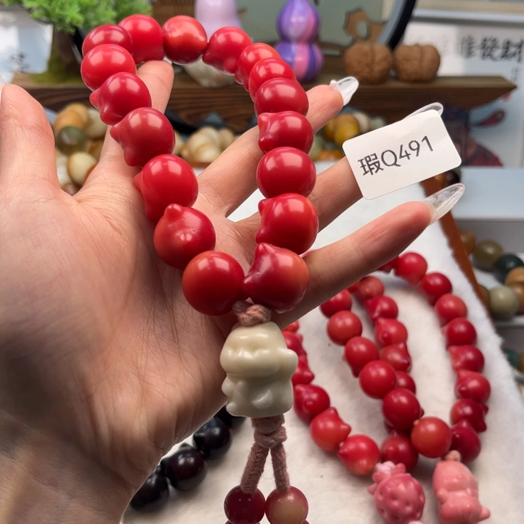 菩提根/象牙果手串艾16+mm瑕猫头手持一串q491