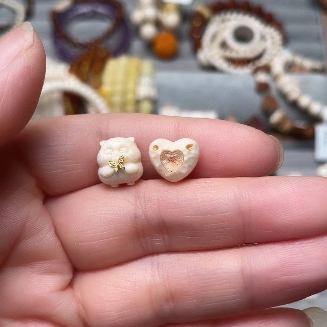 焕***～手串/手链/手镯猛犸象牙蝴蝶猫。镶嵌爱心