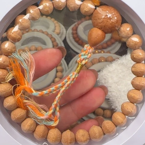 凤眼菩提吊坠9.5手持