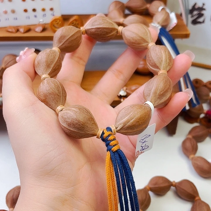 18x28梅林铁核手串9颗