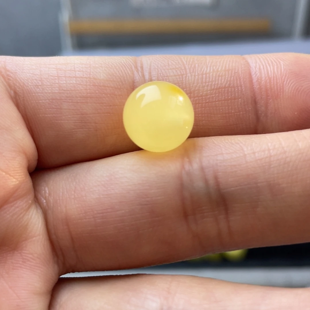 文***森蜜蜡未镶嵌裸石圆珠约11.8毫米一颗