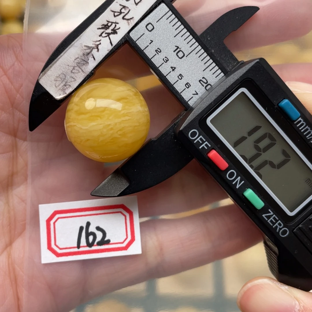 蜜蜡裸石未镶嵌红**张微瑕