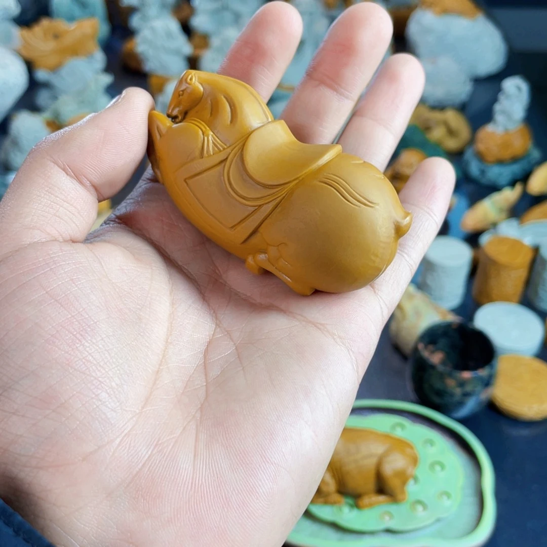 八**金唐马手把金包玉雕刻