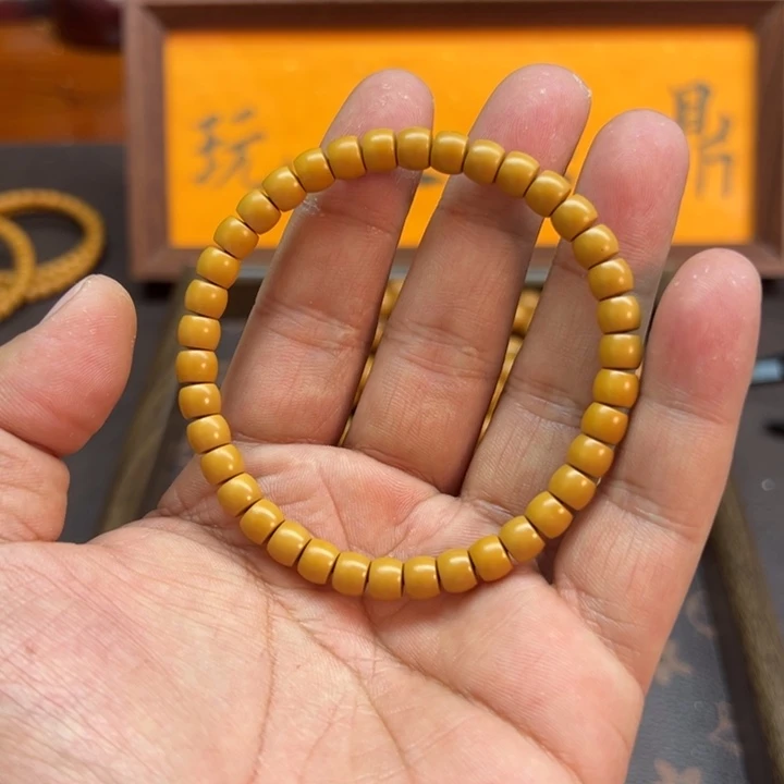 橄榄核吊坠荣**贵0.66核尖手串