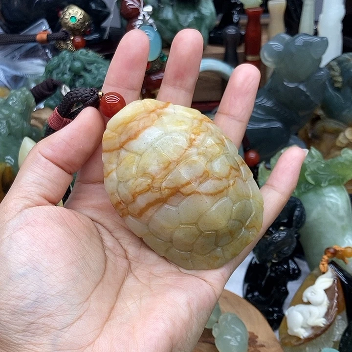 庄***家岫玉未镶嵌手把件