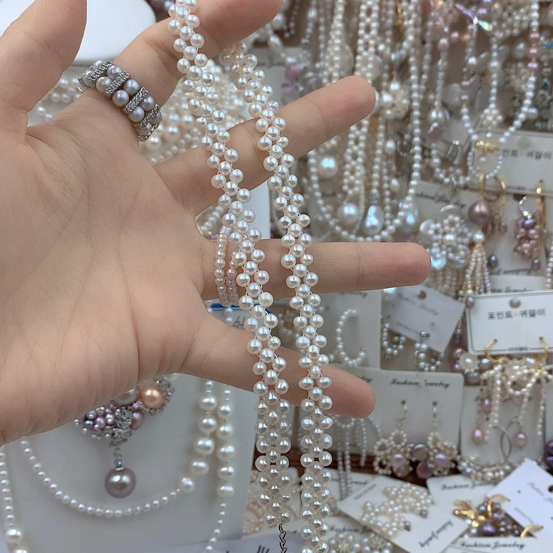 小***子淡水珍珠耳饰银S925镶嵌