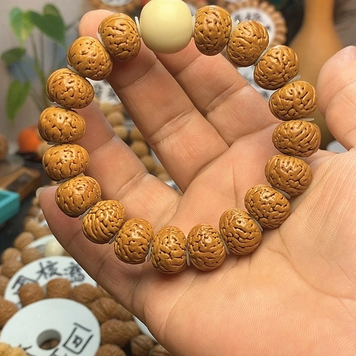 【闪购商品】招**狗桃核手串手链纽扣