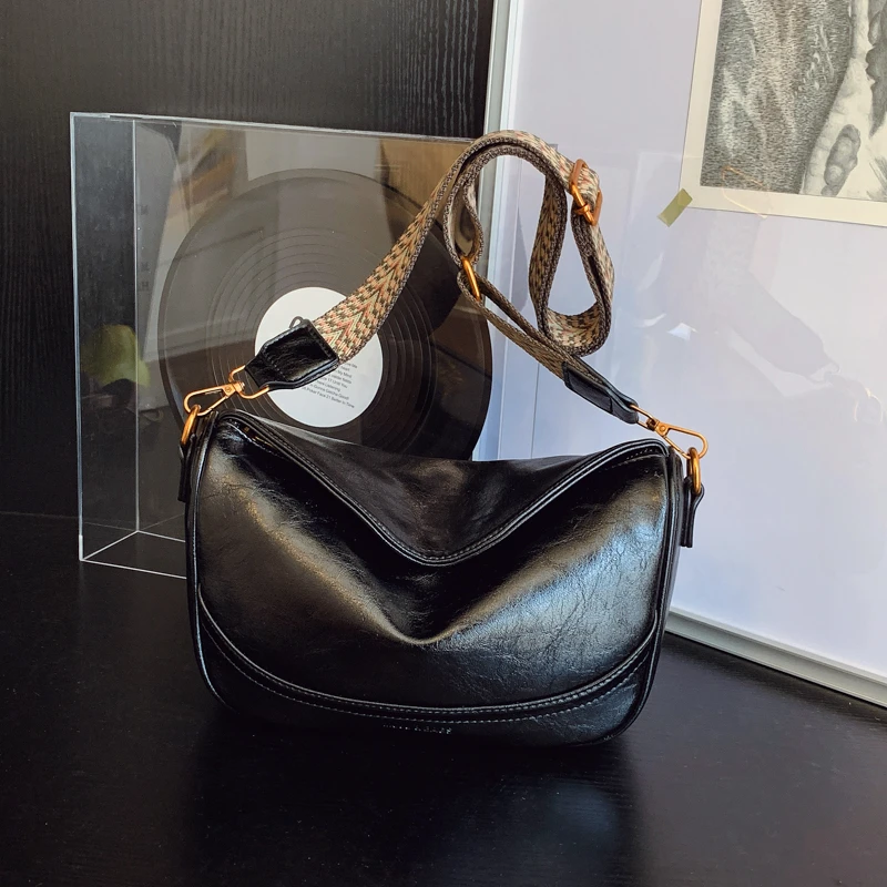 小众设计包包女2025新款美拉德复古单肩腋下百搭斜挎饺子包6059