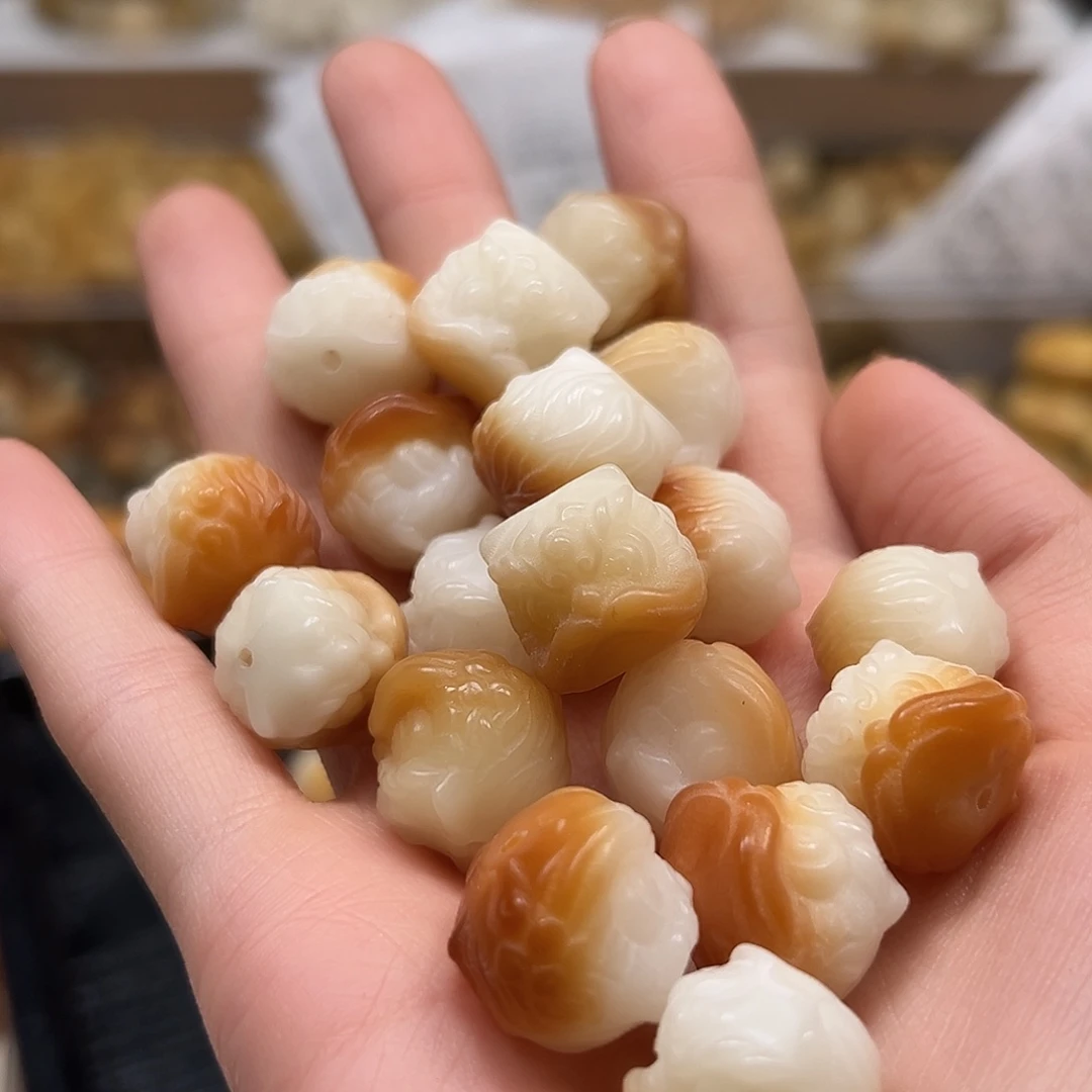手串菩提根/象牙果瑕疵炭烤醒狮100课批发