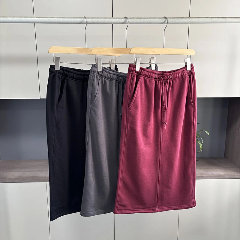 【乌】25春季新款通勤风系带松紧腰半身裙后开叉中长卫裙包臀裙M345