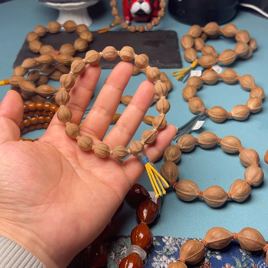 心***L橄榄核手串/手链水晶核1.2正四花蜜桃臀