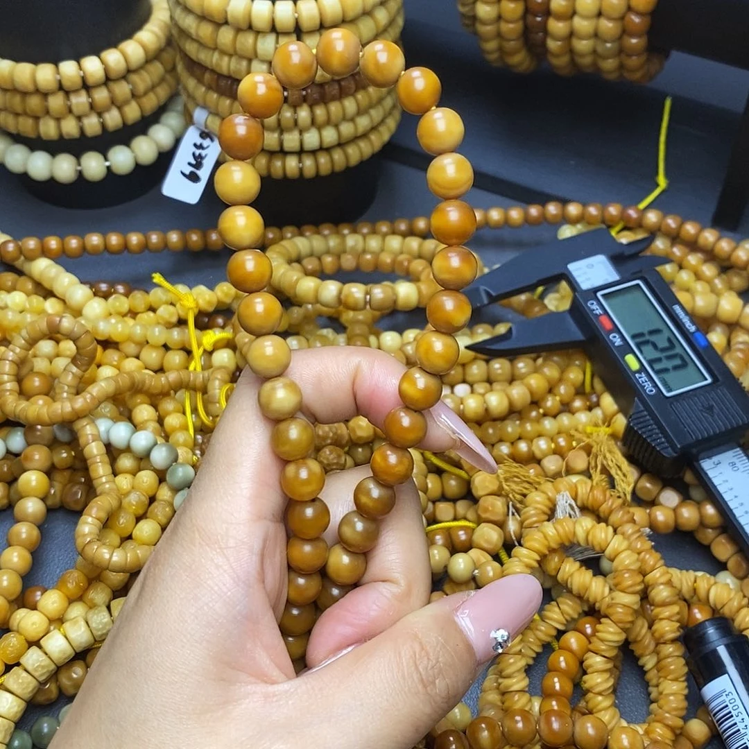 龙眼菩提吊坠何**忧龙脊菩提圆珠手持卡8➕