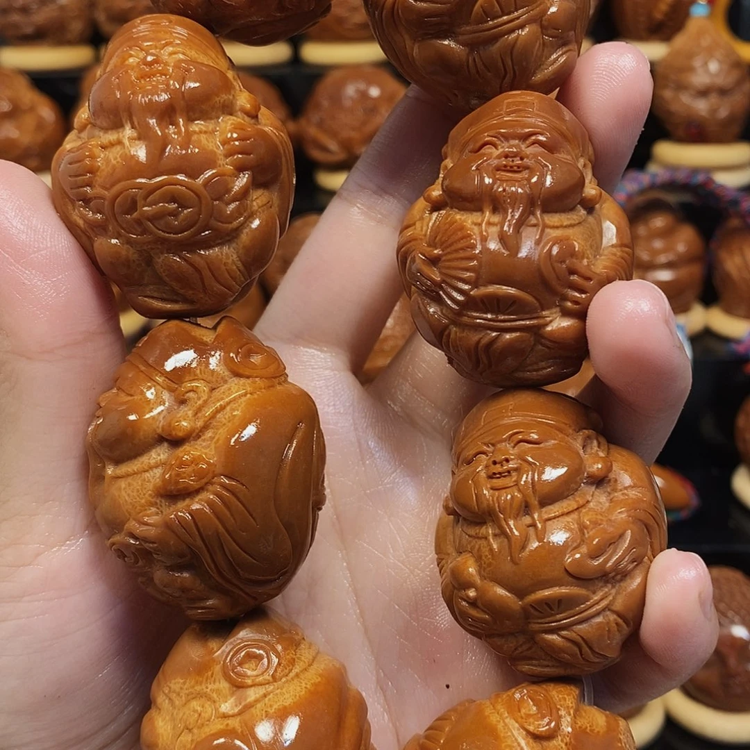 橄榄核吊坠八方来财手持000000888