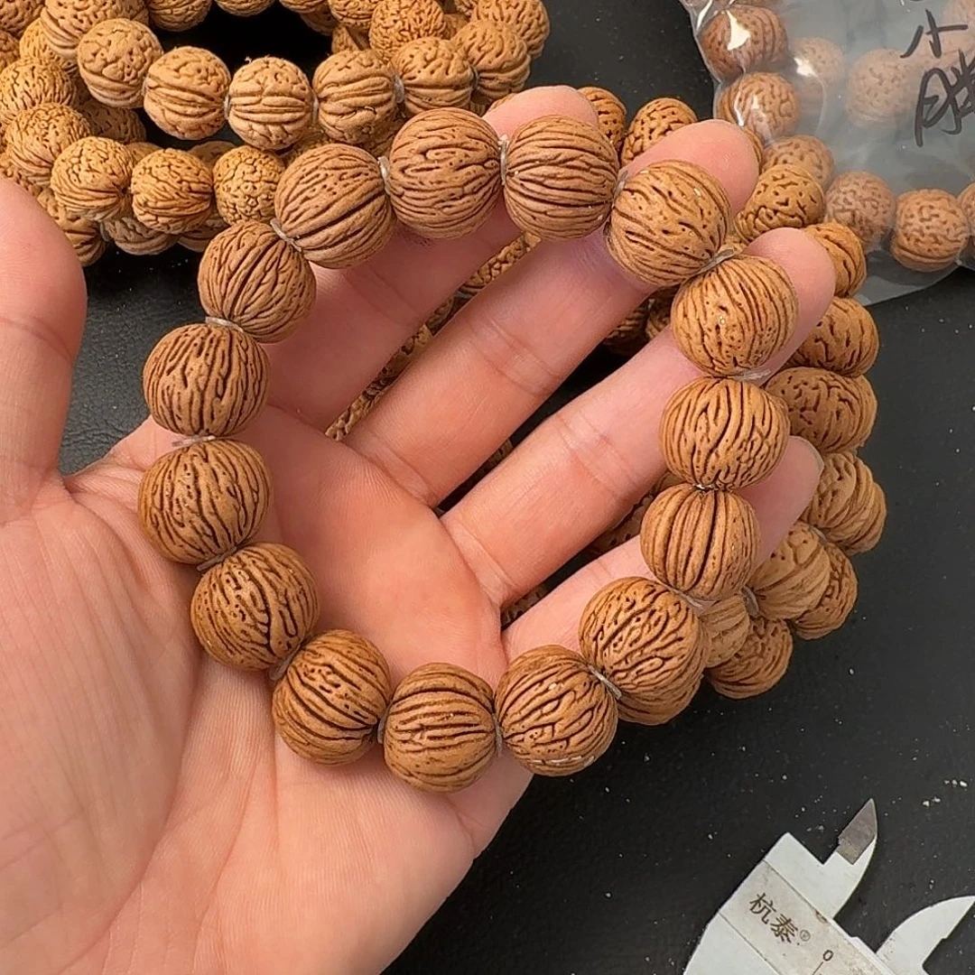 1***1吊坠桃核树纹手串