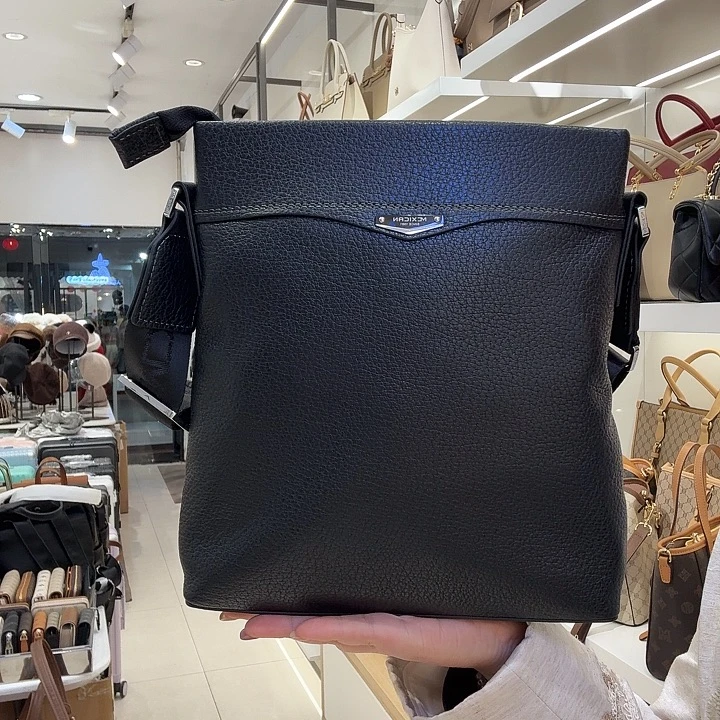 牛皮（革）稻草人男包斜挎包