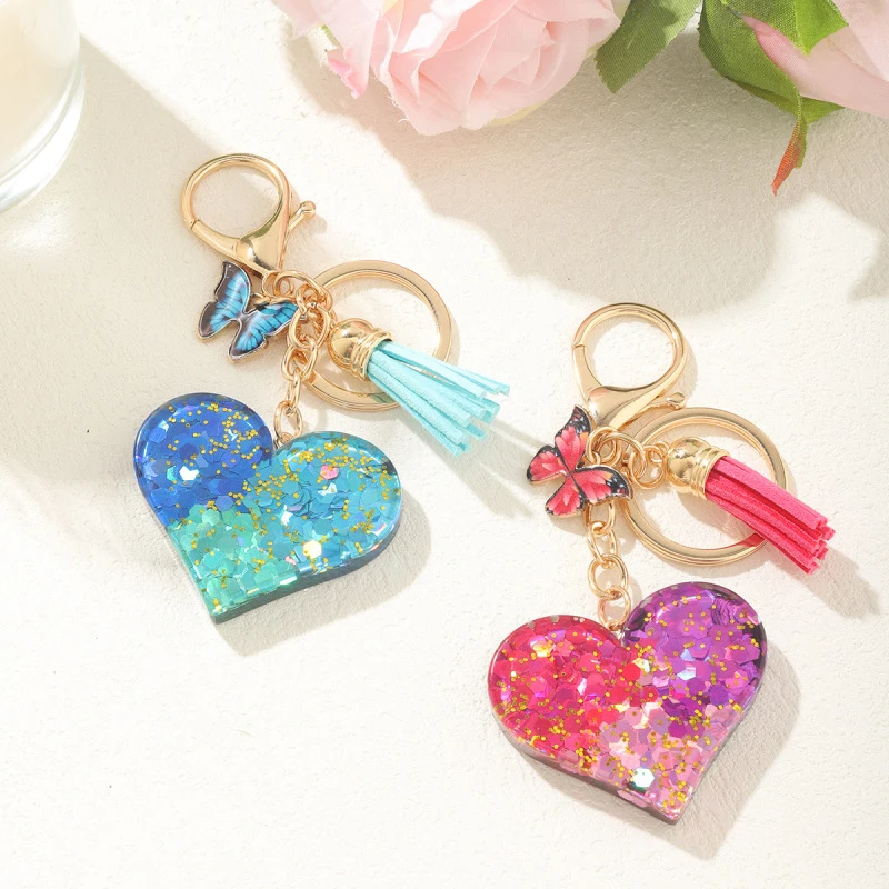 新款创意渐变色亮片心形钥匙扣女士配饰高级感桃心挂件蝴蝶流苏
