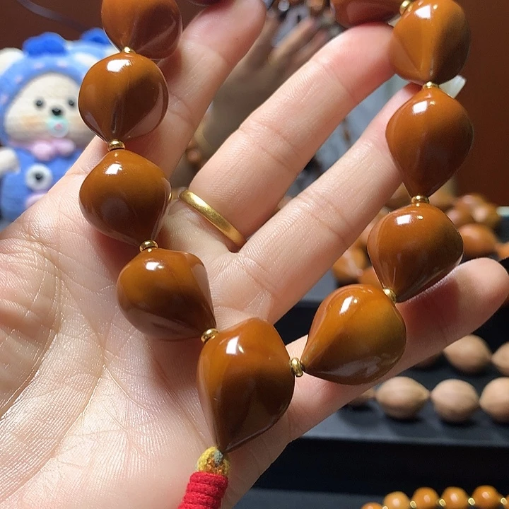 叾***屾手串/手链橄榄核三花手串8