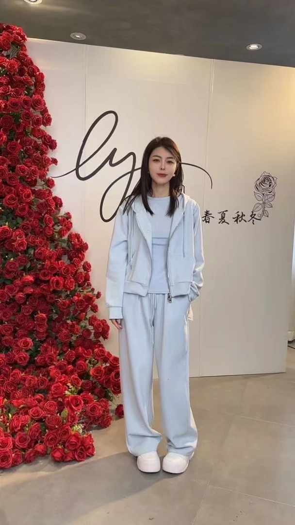 李园家2号店-8606-早春款双拉链连帽外套+阔腿裤烫钻两件套