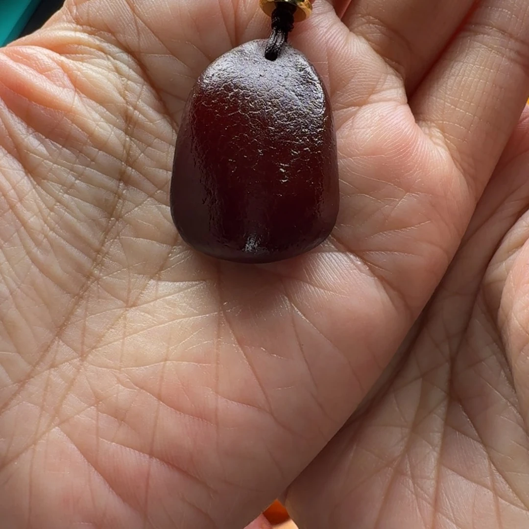 琥珀颈饰未镶嵌吕*阳原石手机挂件