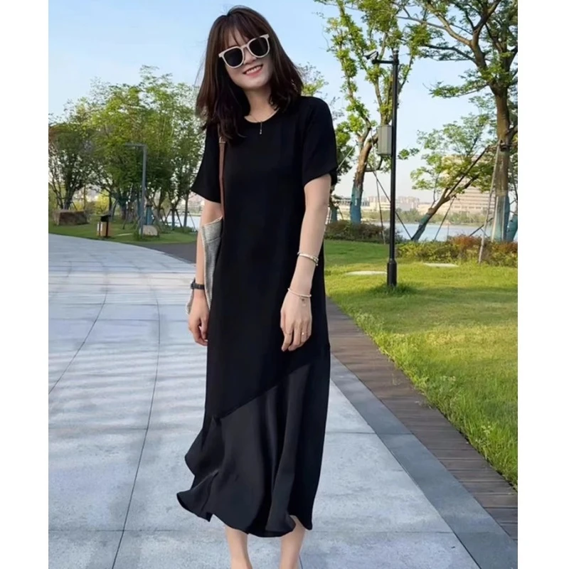 黑色圆领短袖拼接连衣裙女2025夏季新款宽松显瘦设计感气质长裙子
