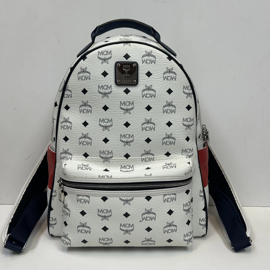 99新 MCM 全皮拼色双肩包1609