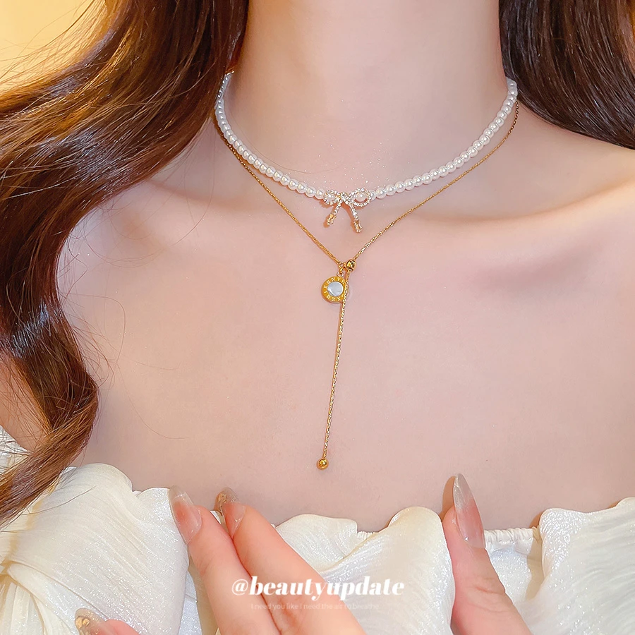 钛钢仿珍珠项链 白色百搭坠链女士珍珠蝴蝶结银法式女