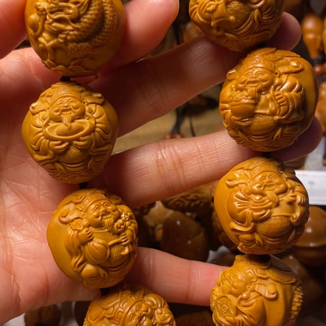 邹***发橄榄核手串/手链九龙大财神