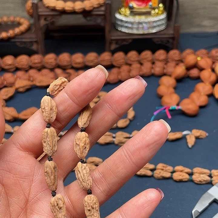 长***司桃核吊坠文玩核桃