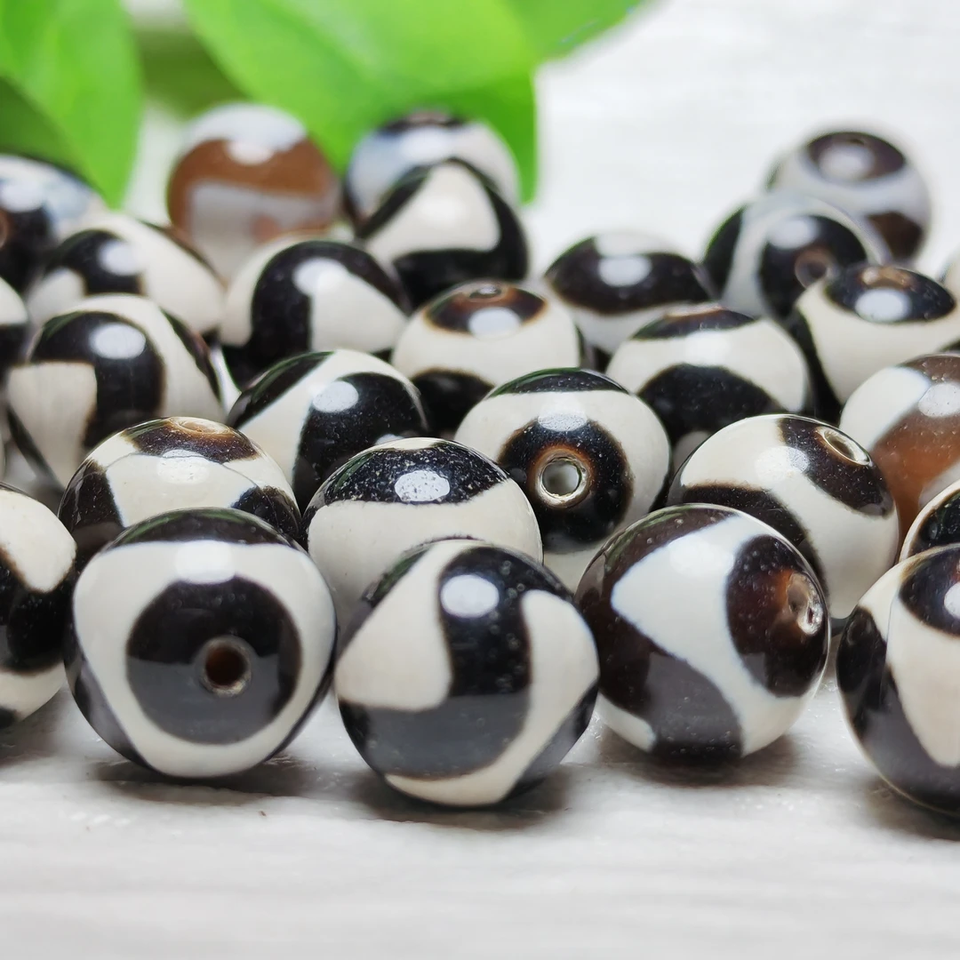10毫米左右玛瑙金刚虎牙珠蚀花镶蚀工艺条纹玛瑙小对珠简约