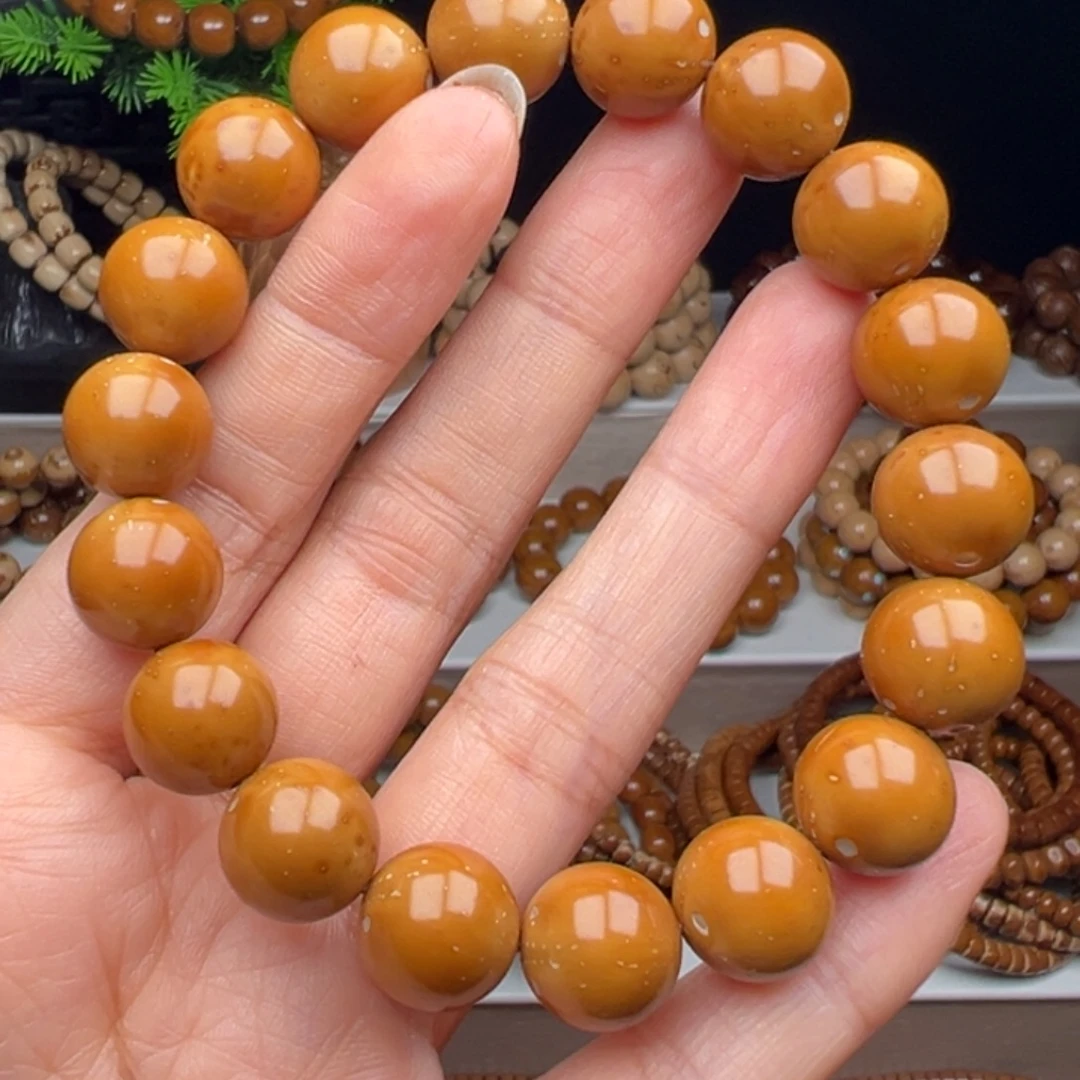 赵***鹏紫金鼠手串卡12.3半实心黄皮光珠