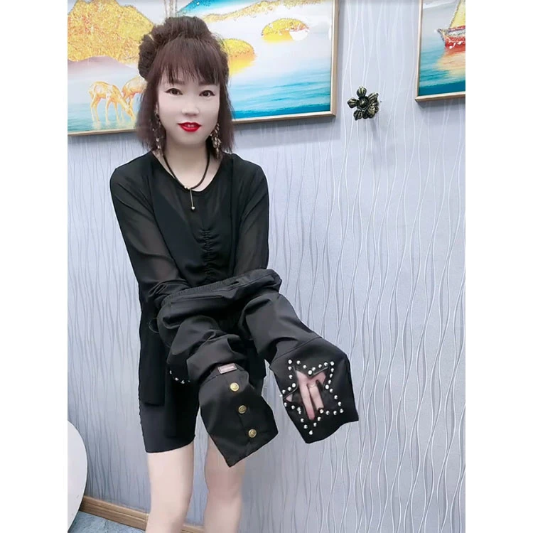 夏季新款镂空水钻重工钉珠五角星小脚裤小众高级感弹力显瘦九分裤