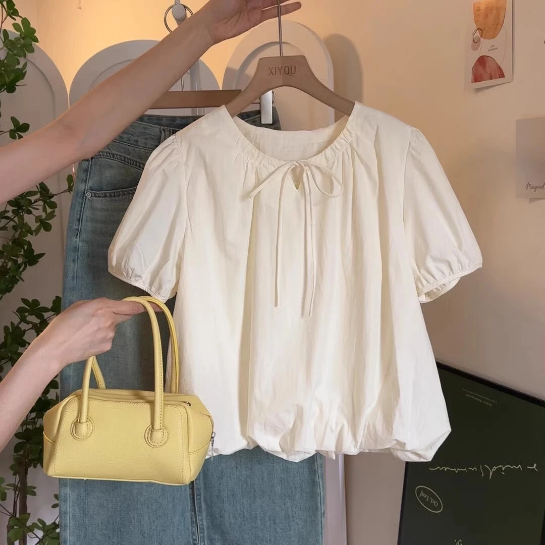 米白色镂空泡泡袖花苞衬衫衬衣女2025新款夏季法式独特绝美小上衣