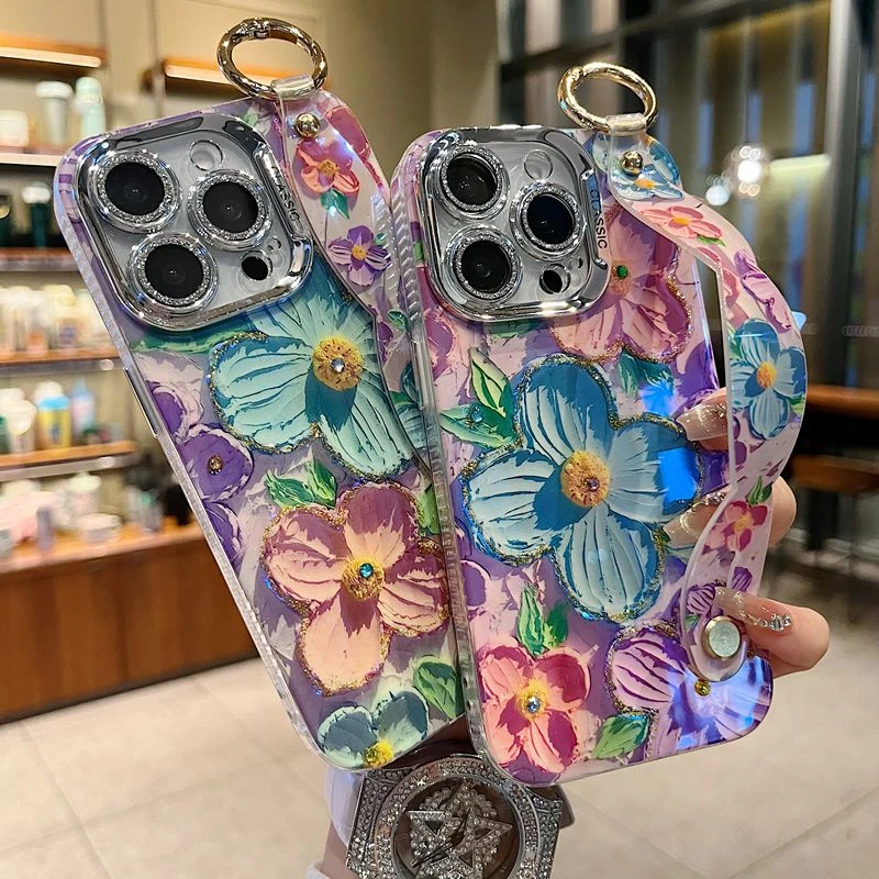 适用苹果系列iPhone16新款手机壳唯美风紫色蝴蝶精孔腕带支架防摔