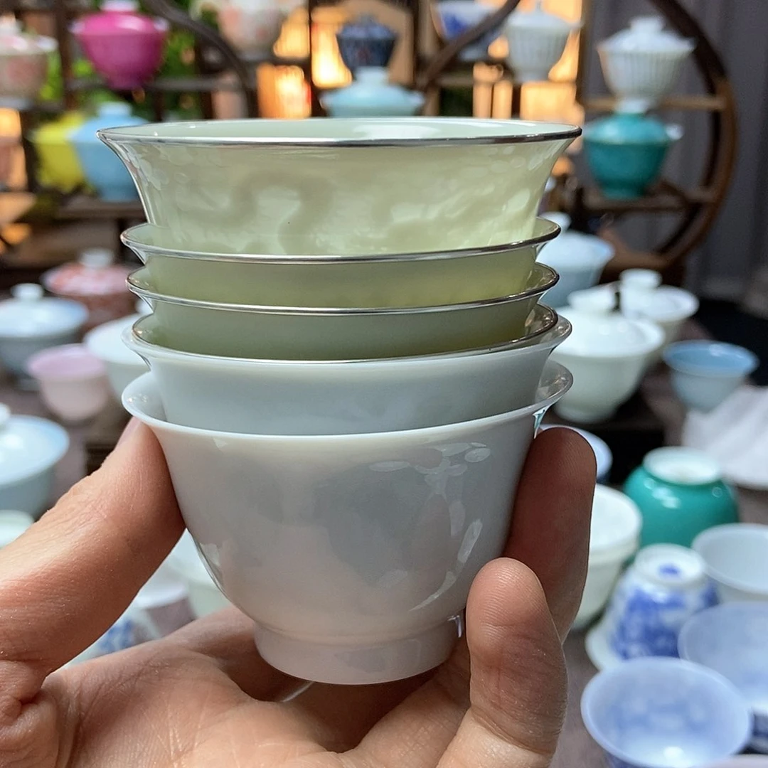 清*微瑕脱胎瓷内模印龙加鱼加开片4杯