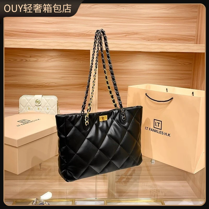 OUY法国轻奢品牌真皮包包女2025新款通勤大容量托特包单肩斜挎包