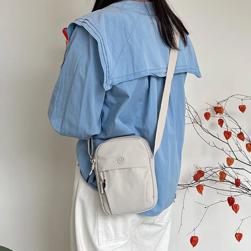 捷朗仕2025新款牛津布单肩斜挎包休闲轻便帆布手机包女迷你小包包