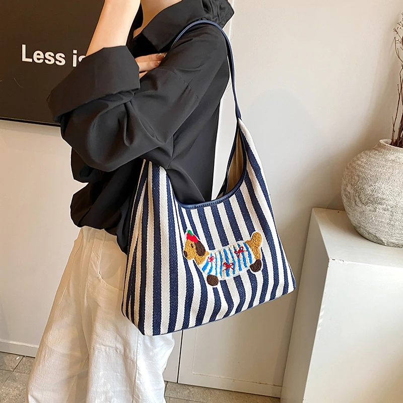 韩版可爱狗狗帆布包新款大容量格子条纹托特包学院风斜挎包