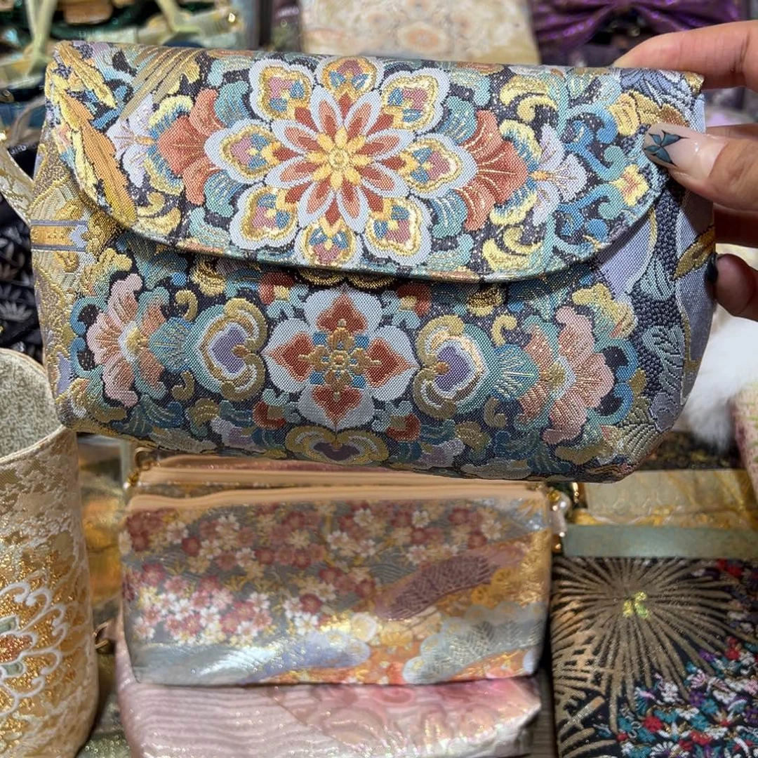 1***3织绣细密织饺子包